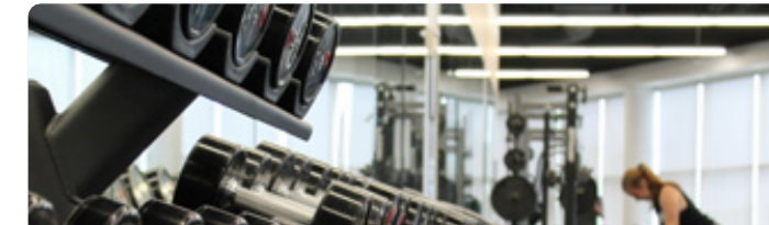 Gym and fitness equipment in a padel club wellness area